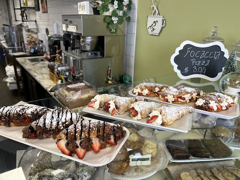 Trays of strawberry and chocolate stuffed croissants on the Asmarina counter